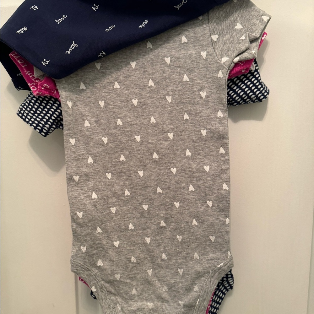 NWT set of 4 CARTER’S ONSIES. Baby Size 9 months Brand New still on hangers NEW - Picture 4 of 12
